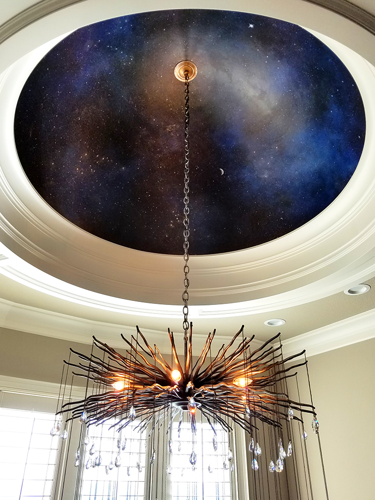 A Vancouver, WA client had a dome ceiling built over the kitchen table and wanted a dramatic night sky. Acrylic paints were used for the sky and highlighted the constellations and stars. All 8 members of the family's zodiac signs were placed in accordance with a certain month and year in the sky that had meaning for the wife.