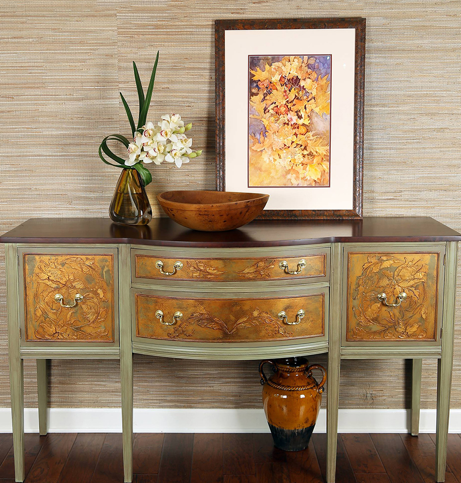 This side table was painted with acrylics paints, metallics, raised stenciling and glazes.