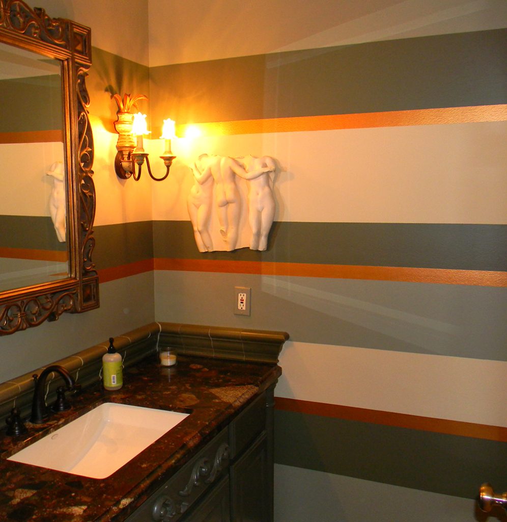 Horizontal striping with latex paint and metallic paint chosen by the designer