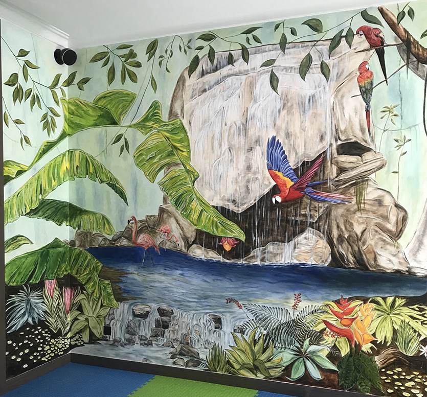 Part of a 4-wall interior residential mural for a jungle-themed children's playroom in Dubai, UAE featuring a waterfall, parrots, and flamingos.