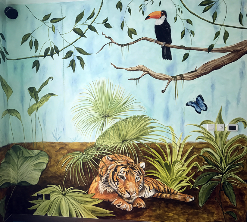 Part of a 4-wall interior residential mural for a jungle-themed children's playroom in Dubai, UAE, featuring a tiger, toucan, and jungle foliage.
