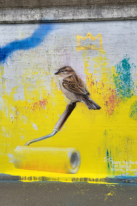 Bismuth Yellow is the background color for the neighboring mural by Chris Eldred, so naturally this house sparrow had to nab some.