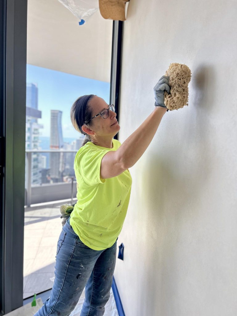 Faux finish resembling venetian plaster performed with sea sponges, rags and brushes:   Miami Brickell District
